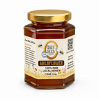 Jar of Clark Bees wildflower honey on a white background